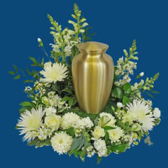 Elegant urn floral arrangements by Chits Floral House