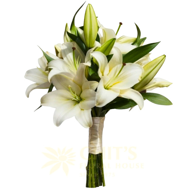 Hand-tiedwhitelilyweddingbouquetforbridechitsfloralhousefrontview