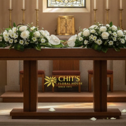 Long and low basket flower arrangement for church offertory table