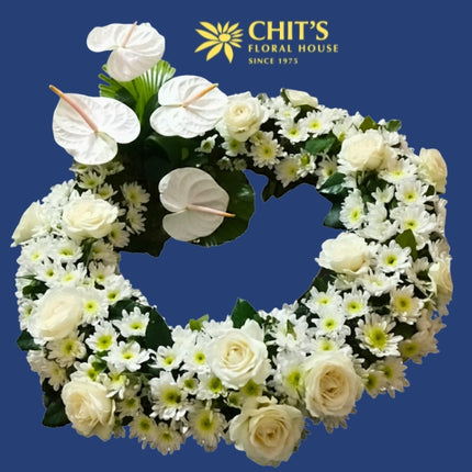 Circle of Eternal Embrace white urn floral arrangement