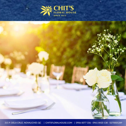 cylinder-vase-wedding-reception-flowers-chits-floral-house