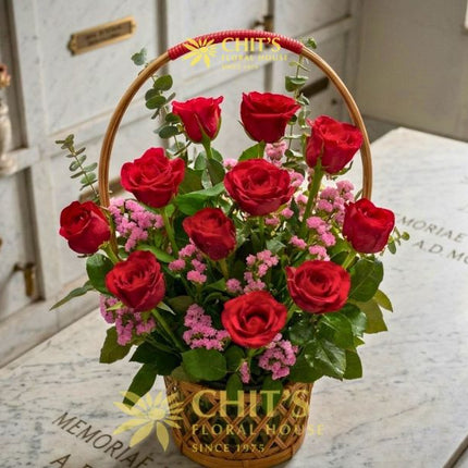 Eternal Love Undas flower basket with red roses and pink statice for cemetery visits