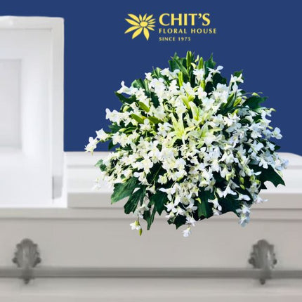 Everlasting Love Orchid Spray funeral casket arrangement with white orchids by Chits Floral House Philippines