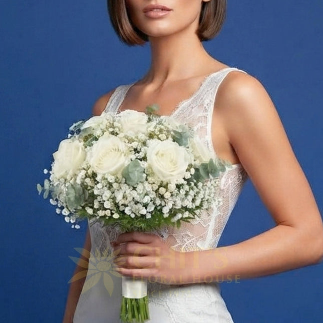 Hand-tied fresh rose wedding bouquet with imported floral accents