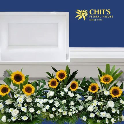 golden-devotion-funeral-flower-arrangement_bychitsfloralhouse