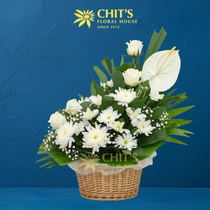 Graveside Serenity Basket – white lily funeral flower arrangement