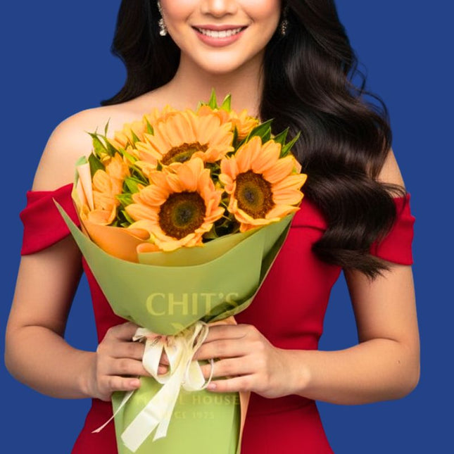 Half-Dozen Radiance six-stem sunflower bouquet with green leaves