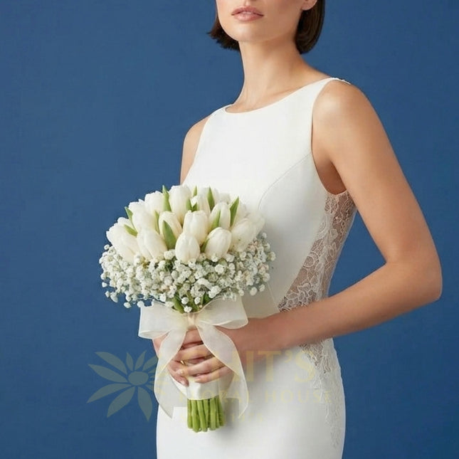Hand-tied tulip wedding bouquet with imported floral accents