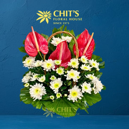 Large Undas flower basket with pink anthuriums and white chrysanthemums for cemetery visits
