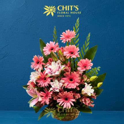 Loving Appreciation funeral flower basket with gerbera and stargazer lilies