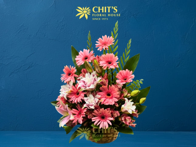 Loving Appreciation funeral flower basket with gerbera and stargazer lilies