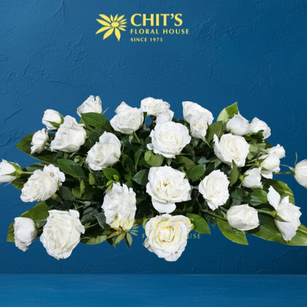 Mass offertory rose bouquet long and low altar flower arrangement