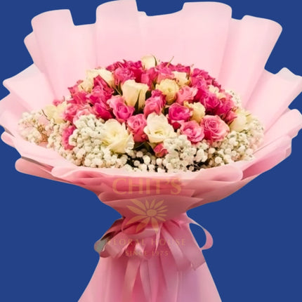 Grand floral arrangement with pink and white roses