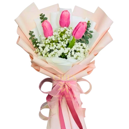 Three-tulip bouquet with imported floral accents