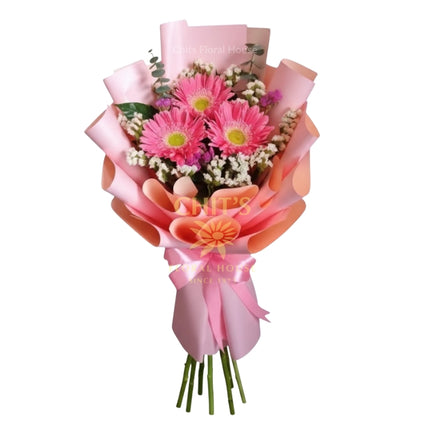 Pink Sunshine Trio bouquet with pink gerbera daisies and imported accents