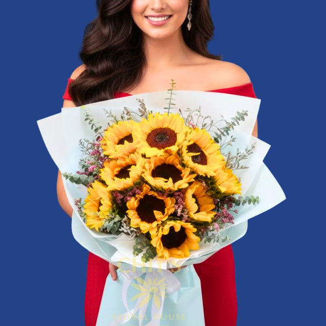 Pure Radiance 10-stem sunflower bouquet with imported accents