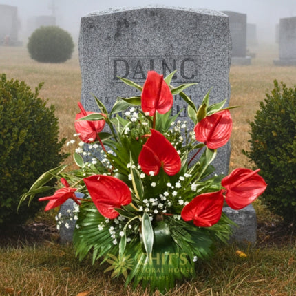 Close-up of red anthurium condolence flower arrangement