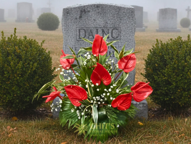 Close-up of red anthurium condolence flower arrangement