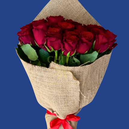 Handcrafted long-stemmed red roses bouquet for romantic occasions
