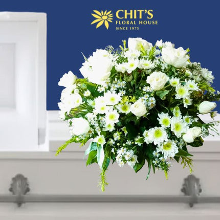Rose of Repose casket flower arrangement with white roses, chrysanthemums, and baby’s breath by Chits Floral House Philippines