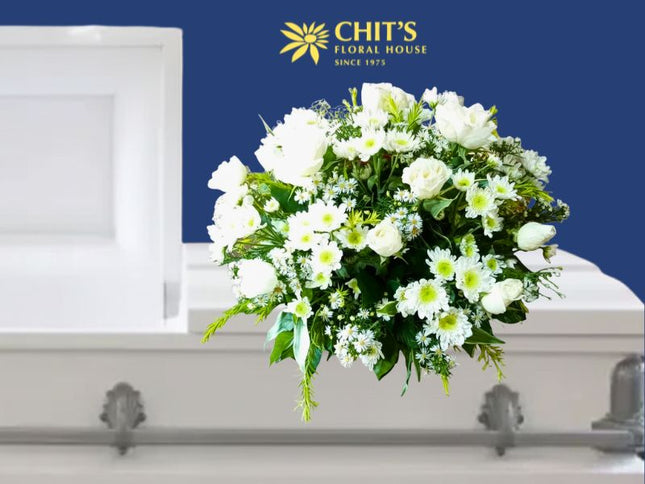 Rose of Repose casket flower arrangement with white roses, chrysanthemums, and baby’s breath by Chits Floral House Philippines