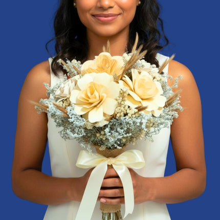 Round dried bouquet for brides with rustic details