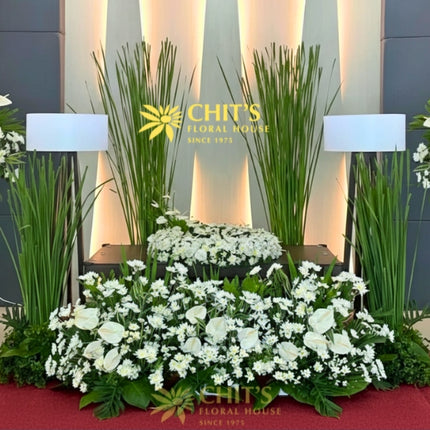 Serenity urn display package with floral backdrop and urn arrangement