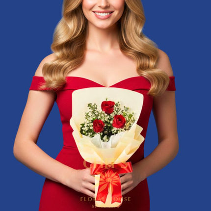 Three Little Words bouquet with three red roses and baby’s breath