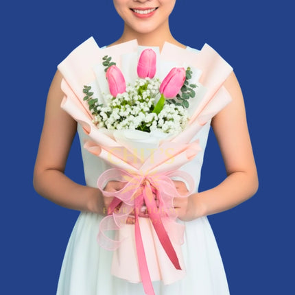 Handy bouquet with three tulips and fillers