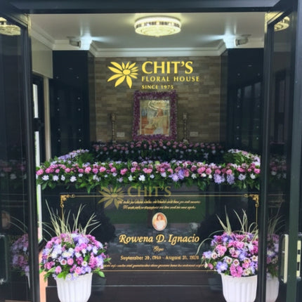 Turnkey mausoleum flower arrangement with topiary vases