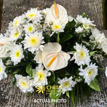 Pure Rest – White Anthurium & Chrysanthemum Casket Spray