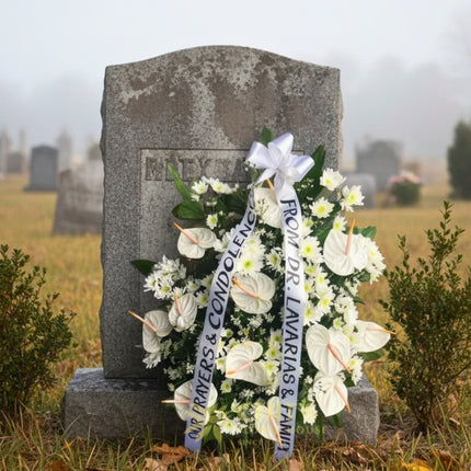 White anthurium and radus condolence arrangement in clay pot