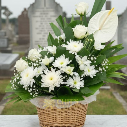 White lily funeral flower basket in a clay pot